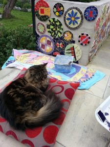 My cat helping with the mosaic wall- The Goddess of Colour
