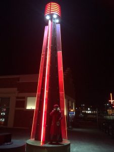 The Goddess of Colour and red lights at Hobart wharf